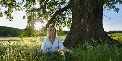 A person practising calm breathing exercises